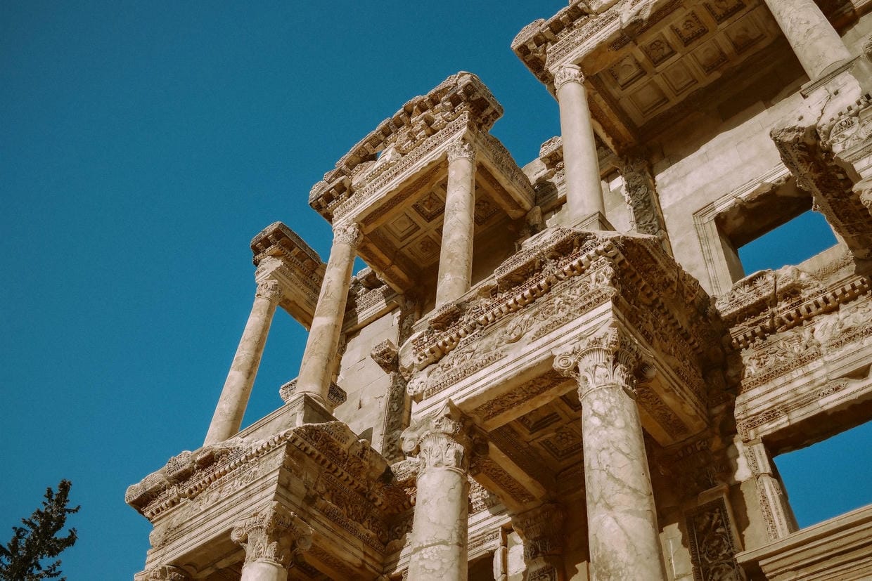 Roman architecture of the Library of Celsus at Ephesus under a blue sky
