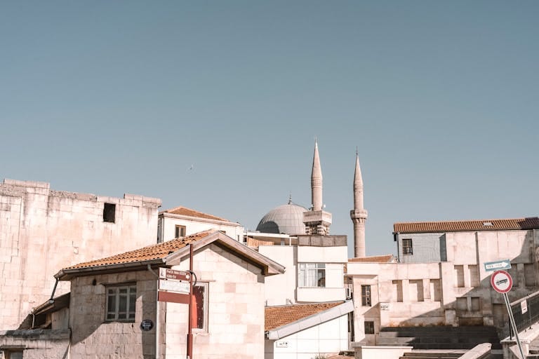 View of traditional architecture and mosque in Gaziantep, showcasing Turkish urban charm.